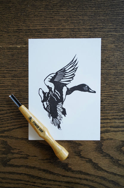 Duck in flight - linocut print