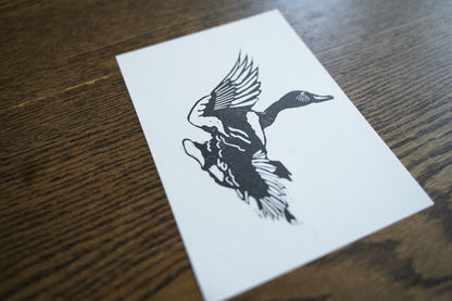 Duck in flight - linocut print